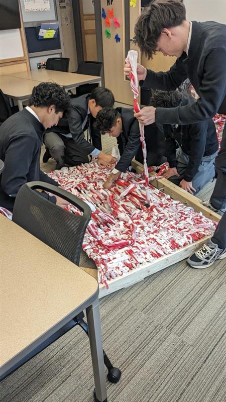 Hearts & Homes volunteers preparing care packages